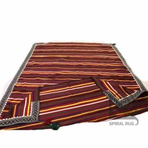 Carpet with embroidery border